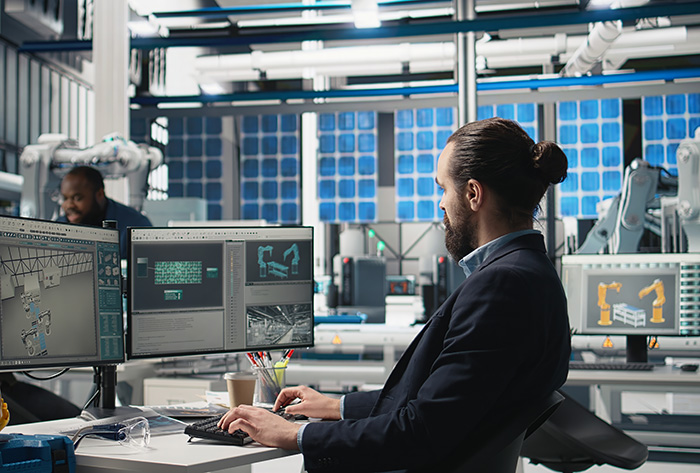 Estimator Working on Computer